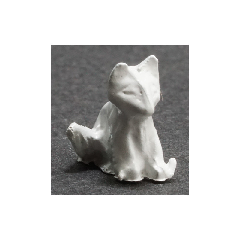 TINY SITTING CAT