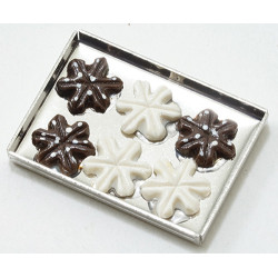 Snowflake Cookies on a sheet