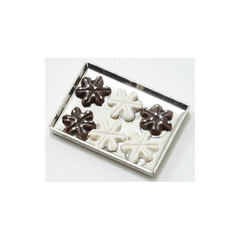 Snowflake Cookies on a sheet