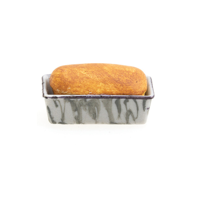 LOAF OF BREAD IN GRAY GRANITEWARE PAN