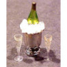 CHAMPAGNE BOTTLE IN ICE BUCKET W/2 FILLED GLASSES